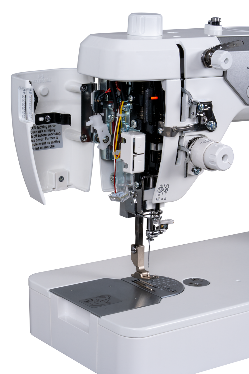 Janome reference photo: HD9QC Professional with the face cover open, showing the LED lighting and dimming control