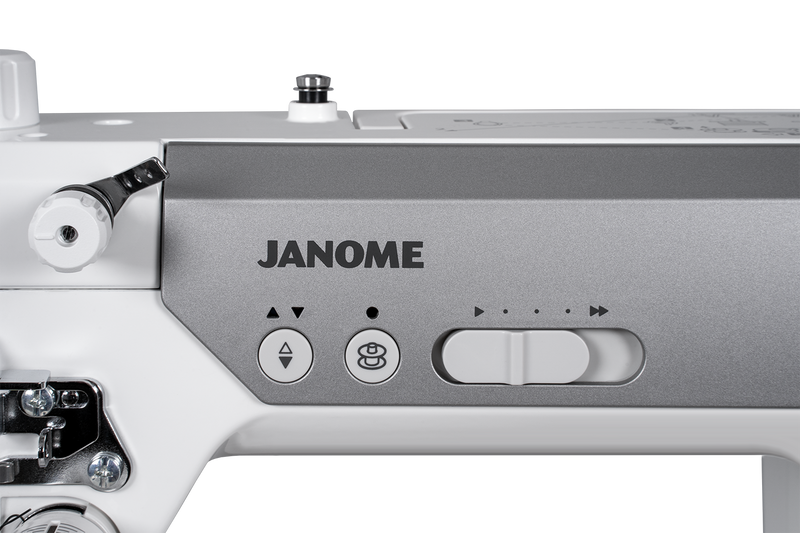 Janome reference photo: HD9QC Professional needle up/down and thread cutter buttons with speed control slider