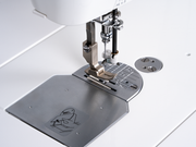Janome reference photo: HD9QC Professional presser foot and needle plate close-up