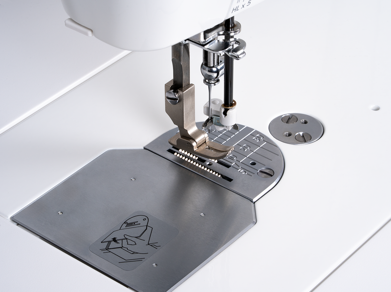 Janome reference photo: HD9QC Professional presser foot and needle plate close-up