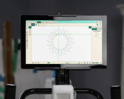 Janome Pro-Stitcher Lite 11-inch touchscreen tablet monitor mounted on a lightweight longarm machine.