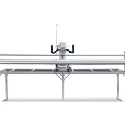 Janome Quilt Maker 18 longarm quilting machine head highlighting the ergonomic handles and LCD touchscreen display.