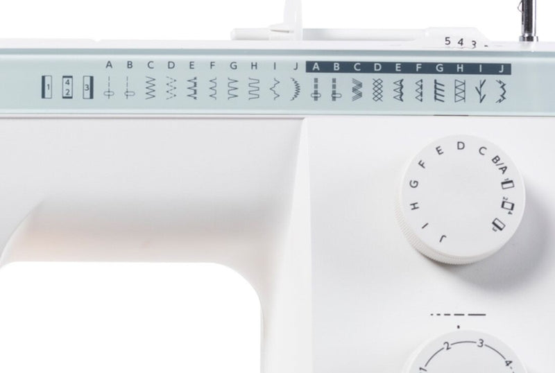 Janome Sewist 721 mechanical sewing machine front view showcasing the stitch selection dial and tension controls.