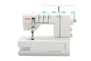 Janome 2000CPX cover hem sewing machine front view showing the color reference chart and extra-long bed