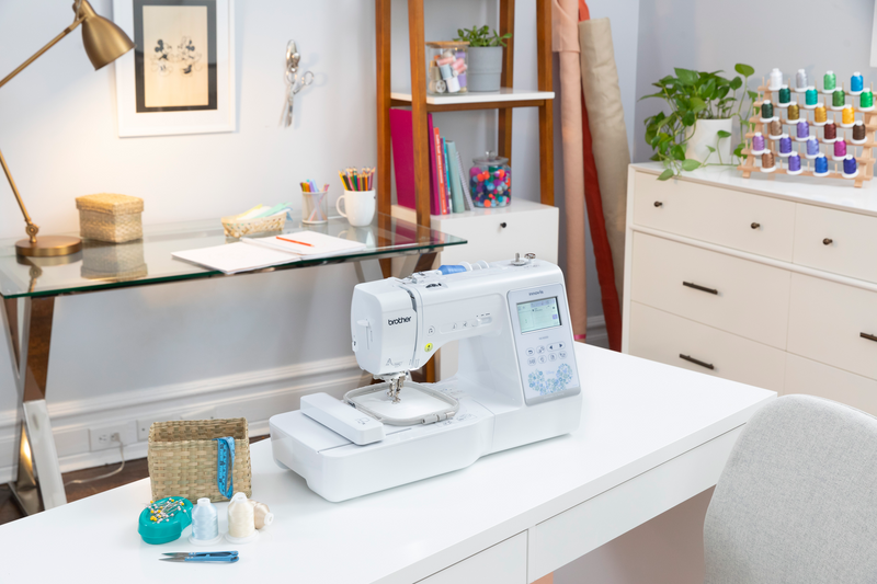 brother-innov-is-ns1850d-combo-sewing-embroidery-machine-displayed-on-table-with-hard-case-wide-table-and-included-accessories