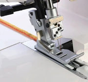 Janome AirThread 2000D Professional overlocker shown fully assembled with the included extra-wide extension table attached.