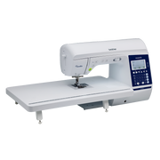 brother-pacesetter-innov-is-ps700-sewing-machine-with-attached-wide-extension-table-isolated-on-black-background