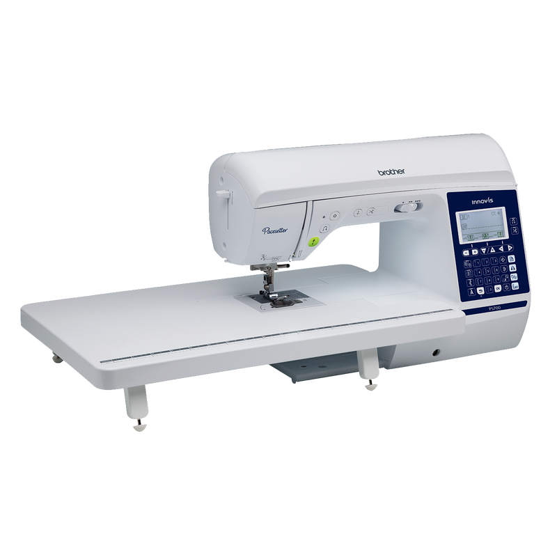 brother-pacesetter-innov-is-ps700-sewing-machine-with-attached-wide-extension-table-isolated-on-black-background