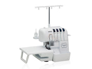 brother-pacesetter-ps3734t-serger-with-attached-wide-extension-table-front-angle-view-isolated-white-background