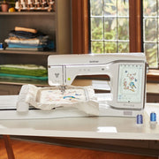 close-up-brother-stellaire-innov-is-xe2-embroidery-machine-stitching-bird-and-butterfly-design