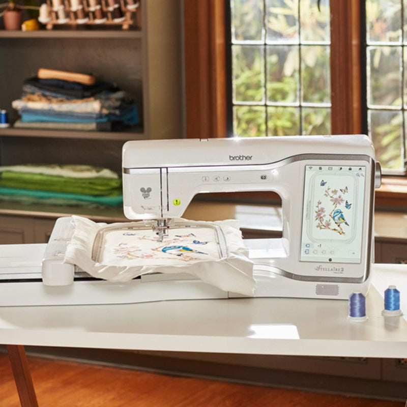 close-up-brother-stellaire-innov-is-xe2-embroidery-machine-stitching-bird-and-butterfly-design