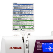 Janome 5300QDC-G computerized sewing and quilting machine in grapevine purple front view.