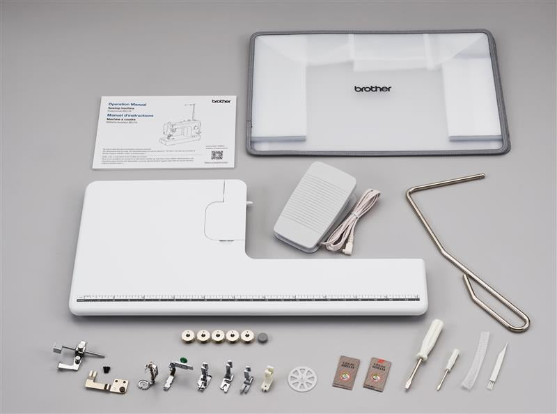 brother-pq1600s-high-speed-straight-stitch-sewing-quilting-machine-included-accessories-and-operation-manual-flat-lay-view