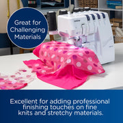 brother-air1800-air-serger-angled-front-view-infographic-highlighting-challenging-materials-with-pink-polka-dot-fabric
