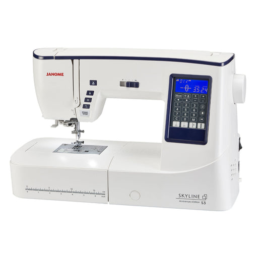 Janome Skyline S3 Anniversary Edition computerized sewing machine front view with extension table installed.