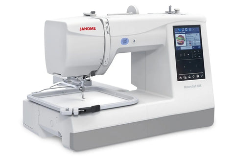 Janome Memory Craft 100E computerized embroidery machine front view showing color touchscreen.