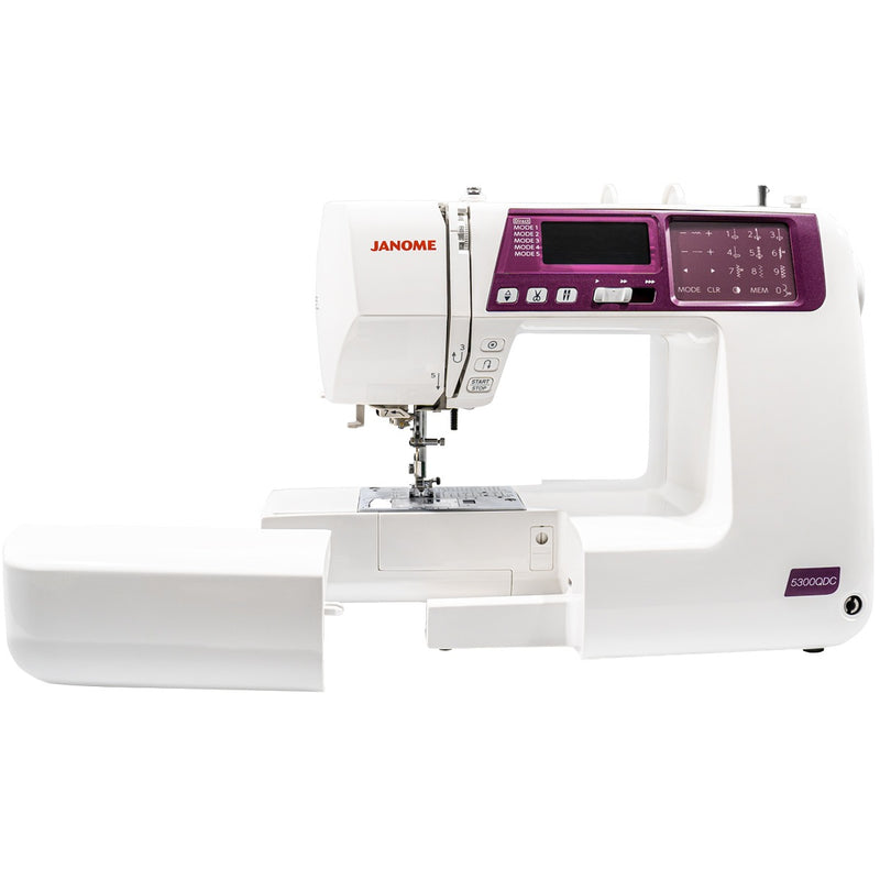 Janome 5300QDC-G computerized sewing and quilting machine in grapevine purple front view.