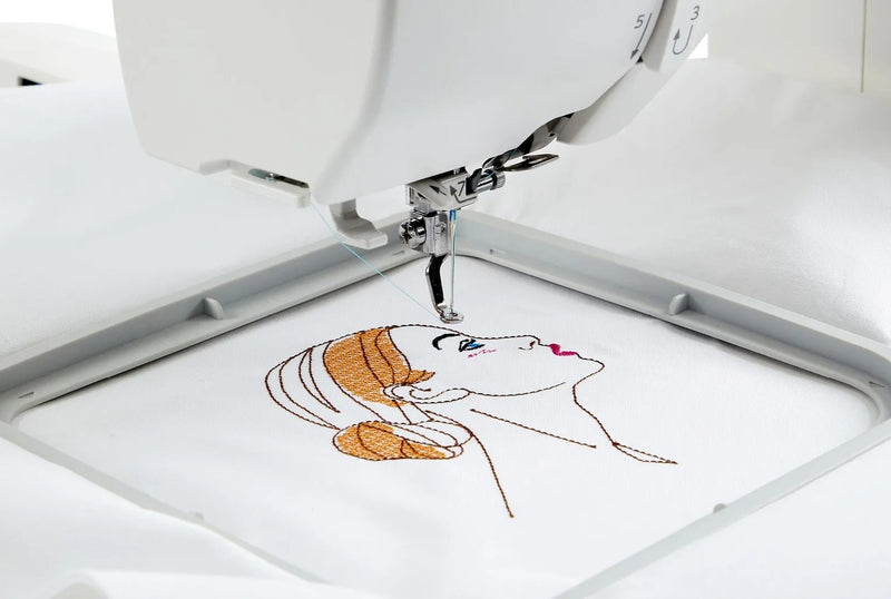 Janome Memory Craft 100E computerized embroidery machine front view showing color touchscreen.