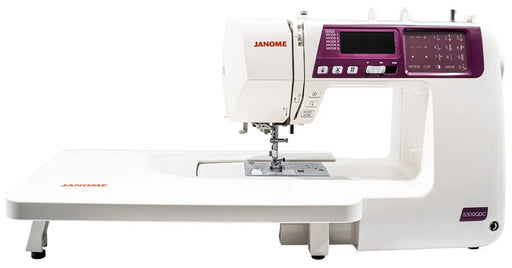 Janome 5300QDC-G computerized sewing and quilting machine in grapevine purple front view.