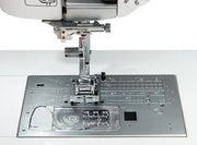 Janome Memory Craft 6650 computerized flatbed sewing and quilting machine