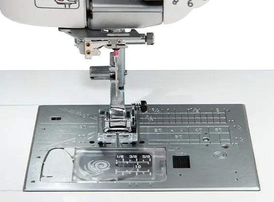 Janome Memory Craft 6650 computerized flatbed sewing and quilting machine