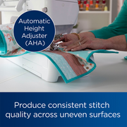 close-up-hands-feeding-light-blue-quilt-under-needle-to-demonstrate-automatic-height-adjuster-on-brother-innov-is-bq3100