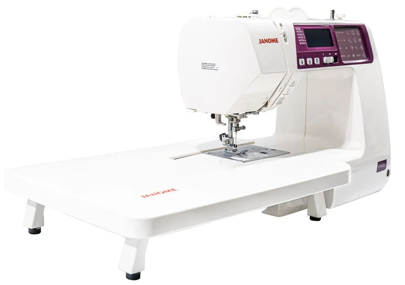 Janome 5300QDC-G computerized sewing and quilting machine in grapevine purple front view.
