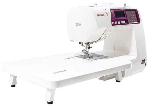 Janome 5300QDC-G computerized sewing and quilting machine in grapevine purple front view.