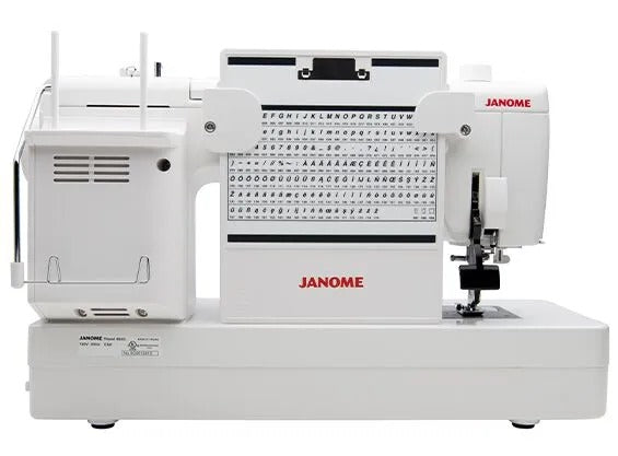 Janome Memory Craft 6650 computerized flatbed sewing and quilting machine