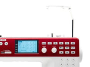 Janome Memory Craft 6650 computerized flatbed sewing and quilting machine