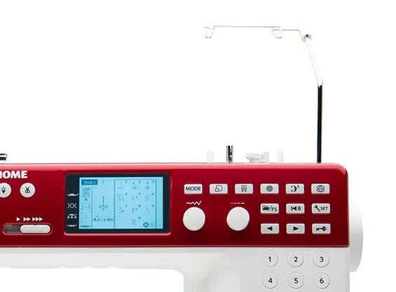 Janome Memory Craft 6650 computerized flatbed sewing and quilting machine