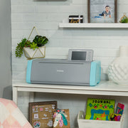 brother-scancut-dx-sdx125-electronic-cutting-machine-on-white-shelf-home-decor-lifestyle-view