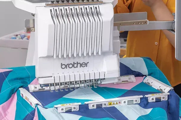 brother-pr1060w-entrepreneur-pro-w-multi-needle-embroidery-machine-quilting-hoop-in-use-on-fabric
