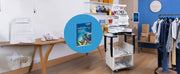 brother-entrepreneur-pro-w-pr1060w-multi-needle-embroidery-machine-mounted-on-prnstd2-machine-stand-in-workspace
