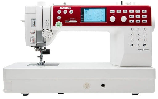 Janome Memory Craft 6650 computerized flatbed sewing and quilting machine