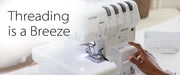 close-up-user-finger-pressing-air-threading-button-on-brother-airflow-3000-air-serger