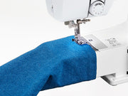 brother-cs5055-computerized-sewing-machine-close-up-free-arm-sewing-blue-denim-view