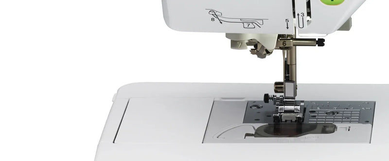 close-up-needle-and-j-presser-foot-aligned-above-needle-plate-on-brother-pacesetter-innov-is-ps500