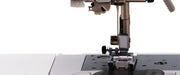 close-up-needle-and-j-presser-foot-aligned-above-needle-plate-on-brother-innov-is-ns80e-sewing-machine
