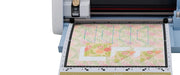 close-up-inserted-fabric-mat-showing-precise-quilt-pattern-cutouts-on-brother-scanncut-dx-innov-is-edition-sdx325