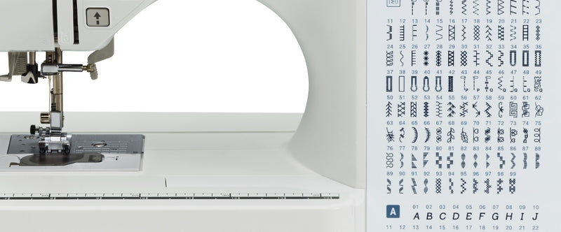 close-up-needle-and-presser-foot-next-to-built-in-stitch-selection-chart-on-brother-pacesetter-innov-is-ps300t