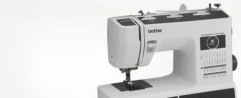 brother-st371hd-strong-and-tough-sewing-machine-close-up-front-angled-view-focusing-on-stitch-selection-chart
