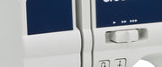 close-up-variable-speed-control-slider-and-reverse-stitch-buttons-on-brother-pacesetter-innov-is-ps300t