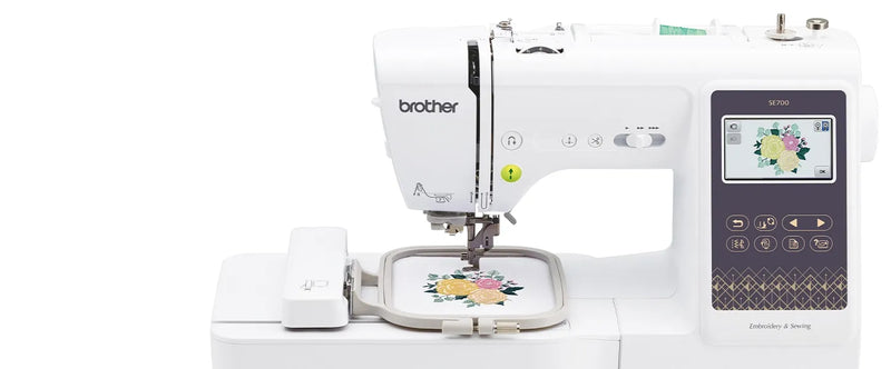 close-up-embroidery-hoop-stitching-floral-pattern-on-white-fabric-with-brother-se700-machine