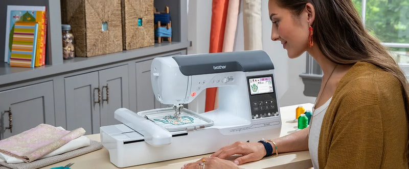 woman-watching-brother-se2000-computerized-sewing-and-embroidery-machine-stitch-teapot-pattern