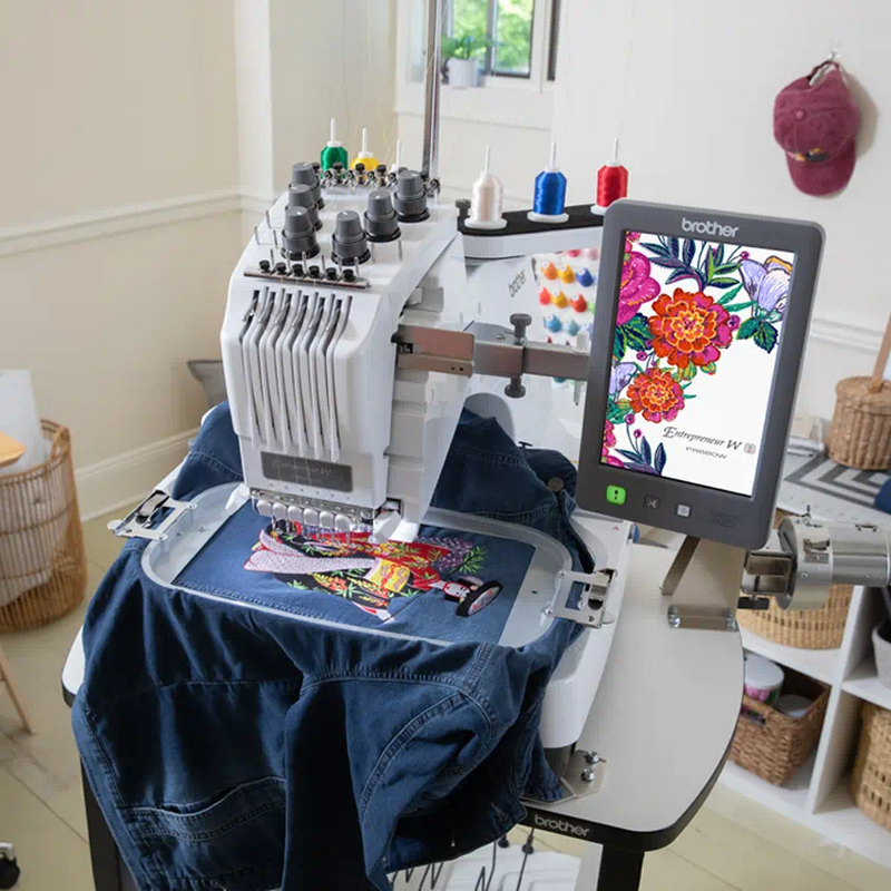 brother-entrepreneur-w-pr680w-6-needle-embroidery-machine-stitching-detailed-floral-design-on-denim-jacket