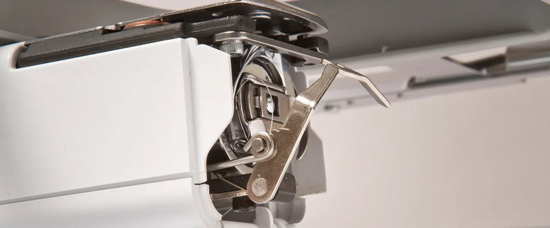 close-up-rotary-hook-shuttle-bay-and-bobbin-case-latch-on-brother-persona-prs100-machine