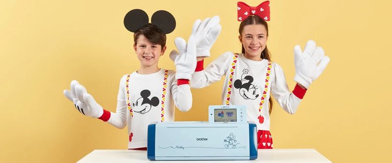 children-wearing-mickey-mouse-ears-and-waving-behind-brother-scanncut-dx-innov-is-edition-sdx330d-disney-cutting-machine