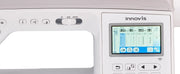 Close-up of the crisp color LCD touchscreen interface on the Brother Innov-is NQ3550W showing embroidery design settings