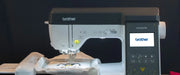 brother-innov-is-ns2850d-combo-sewing-embroidery-machine-close-up-of-needle-area-and-lit-touchscreen